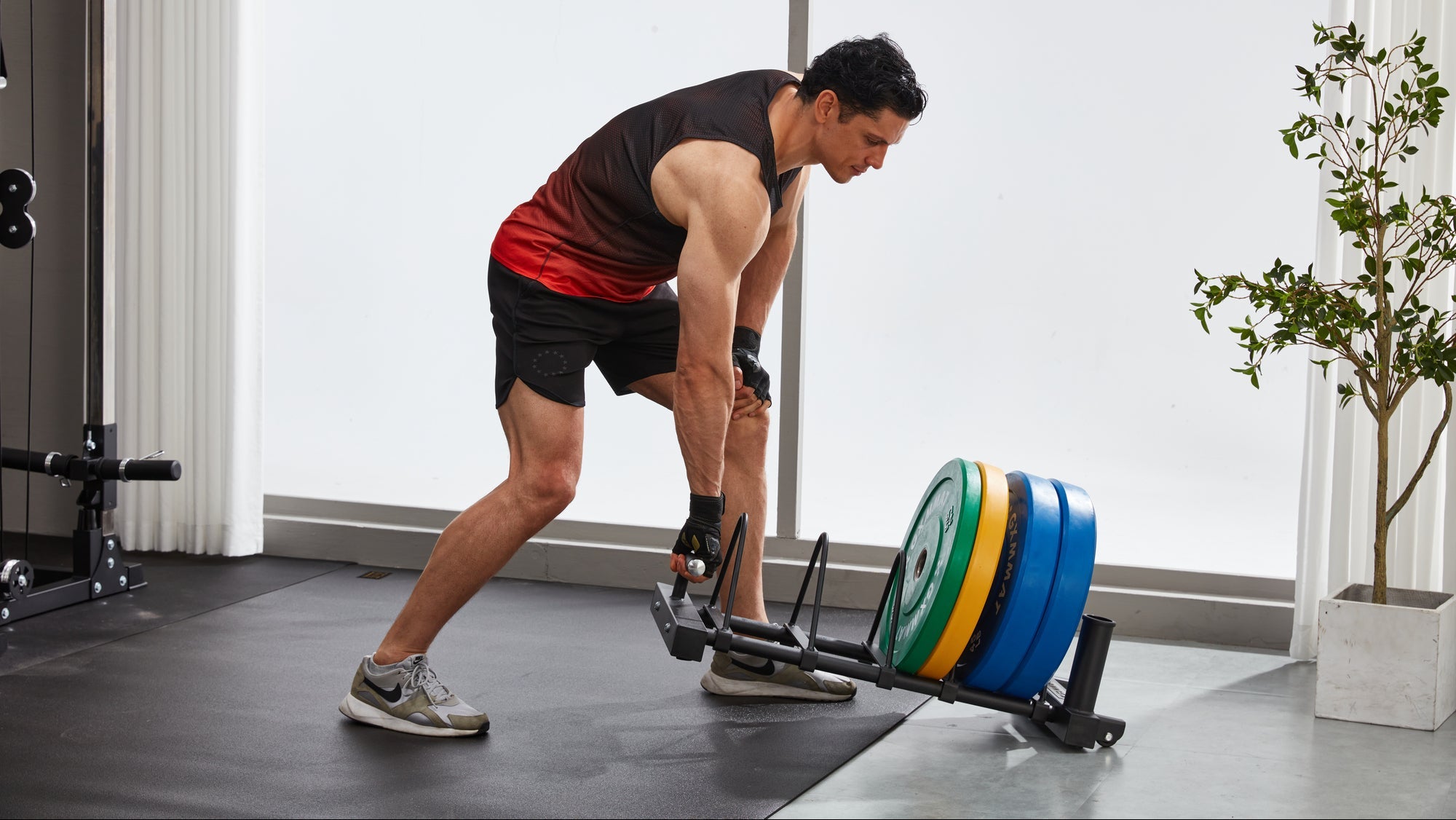 Horizontal  Plate Rack with Wheels Being Lifted and Moved by A Person